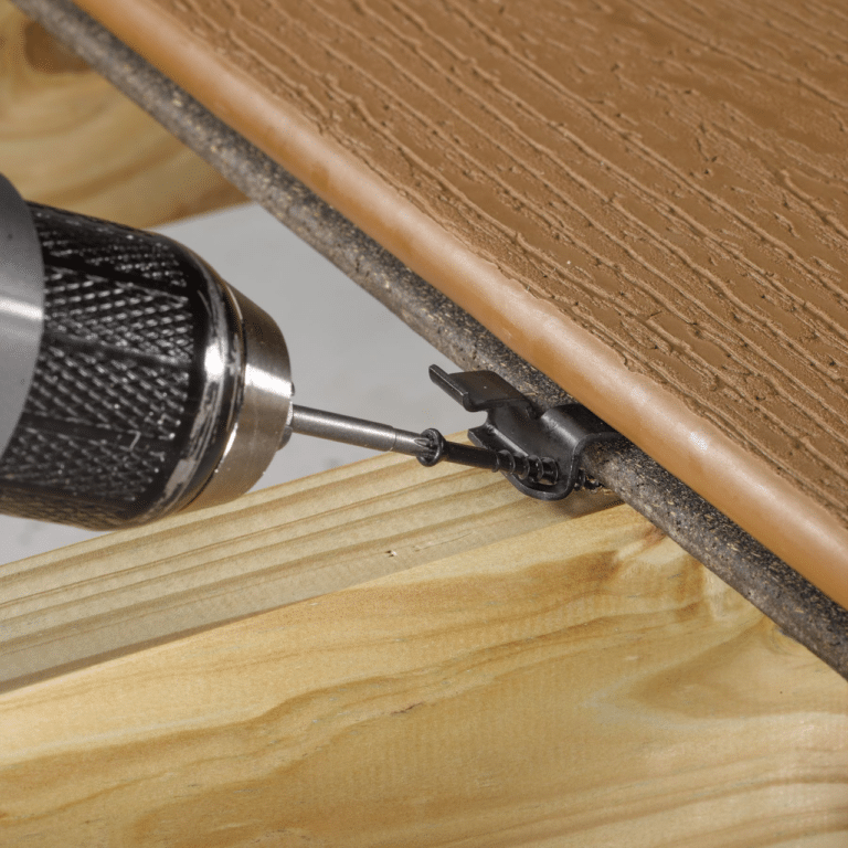 Using a drill to install hidden fastener on composite decking