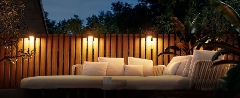 cozy environment with furniture illuminated by fence spotlights