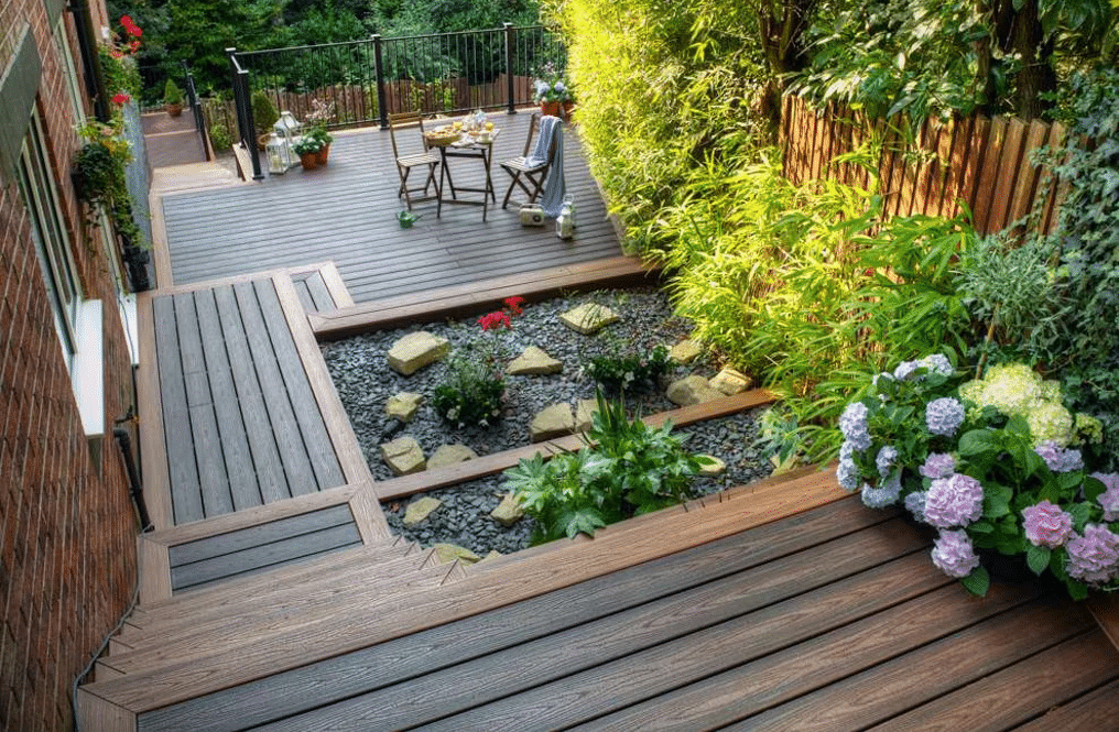 WPC Decking with bold paving stone, gravel inlays between the boards, creating a unique and decorative effect