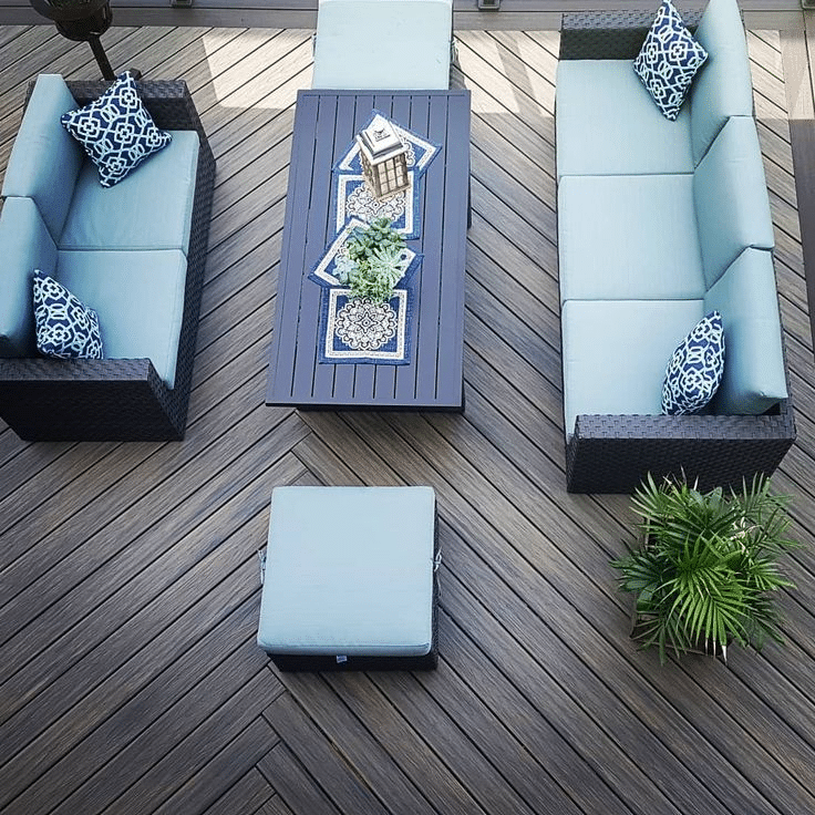 Anthracite grey composite decking in Herringbone Decking Layout
