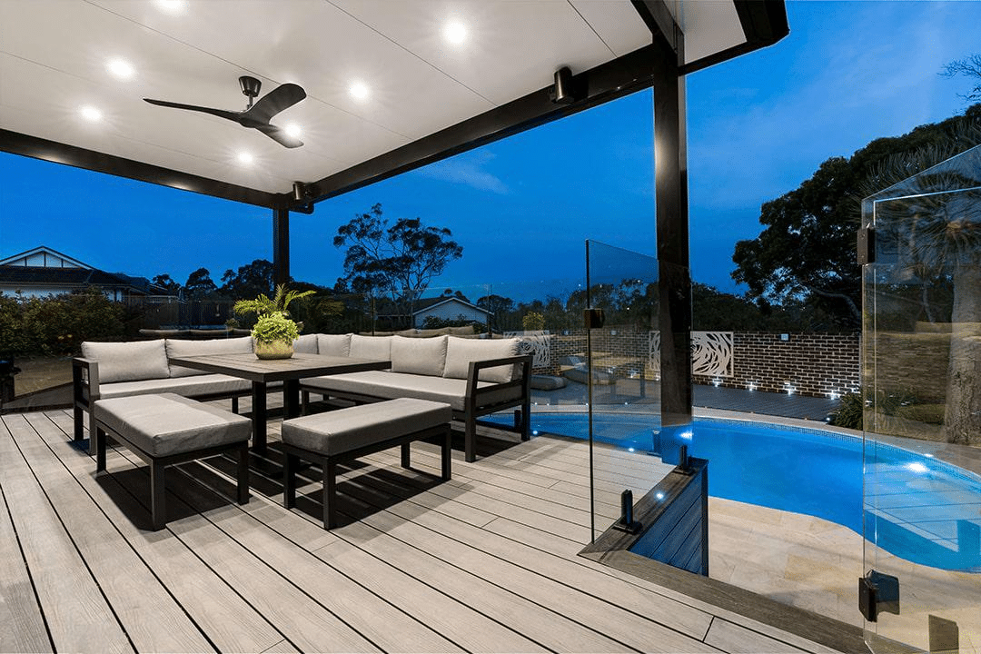Composite decking surrounding poolside in a stylish outdoor space