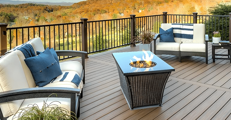 Outdoor space featuring unique seating and a sculpture, creating a standout focal point in the garden