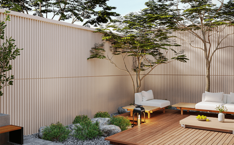 Garden design featuring a mix of WPC decking, stone, and grass to enhance the beauty and detail of a small outdoor space
