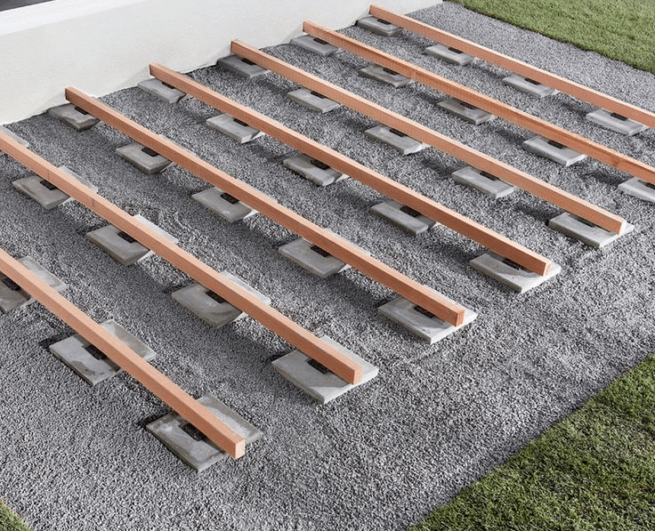Deck piers and footings used for supporting a timber deck