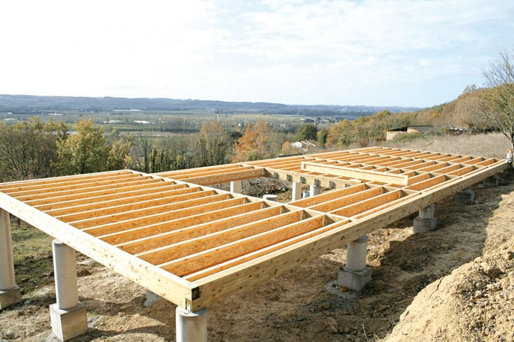 Floating deck foundation providing a solid support for low profile deck