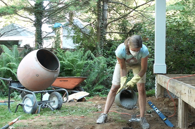Pour concrete to the tube
