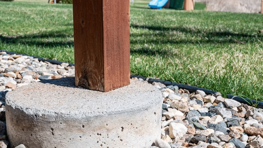 Preformed concrete block supporting deck posts
